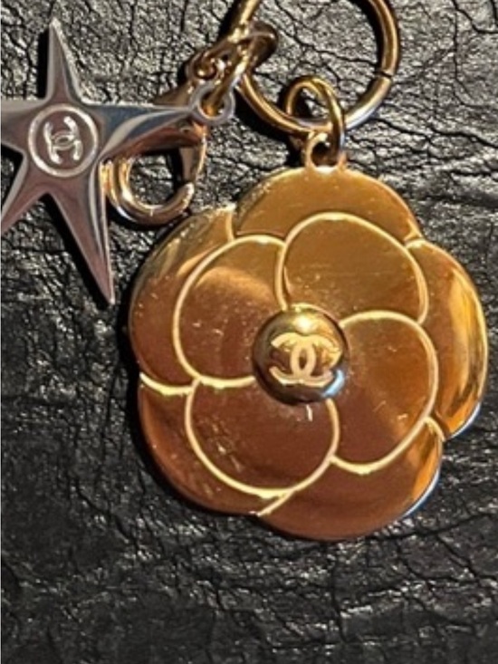 CHANEL Jewelry - CHANEL Gold Camellia with Star Charm